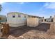 Mobile home with covered patio and storage shed at 701 S Dobson Rd # 343, Mesa, AZ 85202