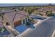 Aerial view of house and surrounding neighborhood at 7075 W Noble Prairie Way, Florence, AZ 85132