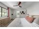 Main bedroom with king bed and access to the bathroom at 7622 E Vista Dr, Scottsdale, AZ 85250