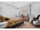 Bedroom with metal bed frame and world map decor at 766 N 153Rd Ave, Goodyear, AZ 85338