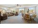 Casual dining area with wooden table and chairs, near living room at 7920 E Frito Dr, Mesa, AZ 85208