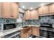 Modern kitchen with copper farmhouse sink and patterned tile backsplash at 941 E 10Th Pl, Mesa, AZ 85203