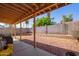 Covered patio and spacious backyard with block wall at 10096 N 63Rd Ave, Glendale, AZ 85302