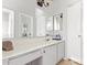 Bathroom features a double vanity and large mirror at 10096 N 63Rd Ave, Glendale, AZ 85302