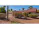 Front view of the house with a saguaro cactus in the yard at 10096 N 63Rd Ave, Glendale, AZ 85302
