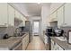Bright kitchen with stainless steel appliances and granite countertops at 10096 N 63Rd Ave, Glendale, AZ 85302