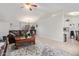 Open living and dining area with high ceiling and tiled floor at 10096 N 63Rd Ave, Glendale, AZ 85302