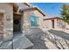 Front door entrance with a decorative wreath and walkway at 10448 E Verbina E Ln, Florence, AZ 85132