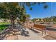 Well-maintained pathway lined with trees and park benches at 1358 N St Paul --, Mesa, AZ 85205