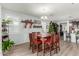 Bright dining area with a table and chairs, open to kitchen and living room at 1358 N St Paul --, Mesa, AZ 85205