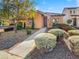 Beautiful stucco home with landscaped yard and walkway at 14933 W Valentine St, Surprise, AZ 85379