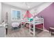 Charming bedroom with a bunk bed and colorful decor at 19615 W San Miguel Ave, Litchfield Park, AZ 85340