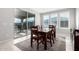 Dining area with sliding glass doors leading to the patio at 19615 W San Miguel Ave, Litchfield Park, AZ 85340