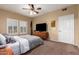 Bright bedroom with a king-size bed and plenty of natural light at 19700 N 76Th St # 2135, Scottsdale, AZ 85255