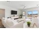 Spacious living room with comfy seating, large windows, and a view at 20236 W Highland Ave, Litchfield Park, AZ 85340