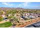 Aerial view of a community near mountains at 22665 W Antelope Trl, Buckeye, AZ 85326