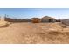 Empty lot with unfinished shed and block wall at 30104 W Indianola Ave, Buckeye, AZ 85396