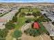 Aerial view of neighborhood park and surrounding homes at 36834 W La Paz St, Maricopa, AZ 85138