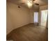 Spacious bedroom with ceiling fan, access to bathroom, and light wood-look flooring at 3848 N 3Rd N Ave # 2010, Phoenix, AZ 85013