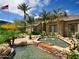 Community entrance with fountain and lush landscaping at 3848 N 3Rd N Ave # 2010, Phoenix, AZ 85013