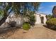 House exterior with front walkway and landscaping at 43842 W Elizabeth Ave, Maricopa, AZ 85138