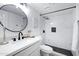 Modern bathroom with marble shower and black fixtures at 4610 N 68Th St # 417, Scottsdale, AZ 85251