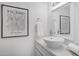 Modern bathroom with a white vessel sink and minimalist decor at 4610 N 68Th St # 417, Scottsdale, AZ 85251