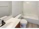 Simple bathroom with white toilet and bathtub at 6303 N 131St Dr, Litchfield Park, AZ 85340