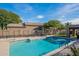 Inviting community pool with seating area, perfect for relaxation at 8926 E Calle Buena Vis, Scottsdale, AZ 85255