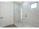 Spa-like bathroom with a large walk-in shower and brick tile at 9872 W Black Hill Rd, Peoria, AZ 85383