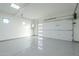 Clean and spacious garage with automatic door and epoxy floor at 9872 W Black Hill Rd, Peoria, AZ 85383