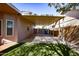 Covered carport with artificial turf and block wall at 10225 W Denton Ln, Glendale, AZ 85307