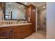 Bathroom with double vanity and walk-in shower at 10575 E Rising Sun Dr, Scottsdale, AZ 85262