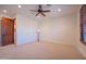 Bright bedroom with large window and plush carpet at 10575 E Rising Sun Dr, Scottsdale, AZ 85262