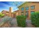 Charming two-story home with stucco exterior and landscaping at 10575 E Rising Sun Dr, Scottsdale, AZ 85262