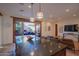 Kitchen with granite countertops and view of a patio at 10575 E Rising Sun Dr, Scottsdale, AZ 85262