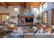 Spacious living room features a large fireplace and comfortable seating at 10575 E Rising Sun Dr, Scottsdale, AZ 85262
