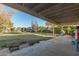 Large backyard patio with view of the grassy area at 12011 N 30Th Pl, Phoenix, AZ 85028