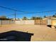 Large backyard with block wall and gate at 1410 E Almeria Rd, Phoenix, AZ 85006