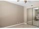 Spacious bedroom with mirrored closet and neutral walls at 14645 N Fountain Hills Blvd # 107, Fountain Hills, AZ 85268