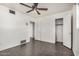 Bedroom with ceiling fan, closet, and tile floors at 1465 E 2Nd Ave, Mesa, AZ 85204