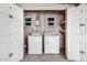 Laundry room with washer, dryer, and shelving at 1465 E 2Nd Ave, Mesa, AZ 85204