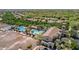 Aerial view of community pool, clubhouse and basketball court at 19950 W Heatherbrae Dr, Litchfield Park, AZ 85340