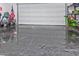 Garage with epoxy flooring and shelving for storage at 19950 W Heatherbrae Dr, Litchfield Park, AZ 85340