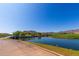 Golf course with stone bridge and pond at 19950 W Heatherbrae Dr, Litchfield Park, AZ 85340