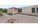Covered patio and gravel yard with desert landscaping at 215 N Power Rd # 361, Mesa, AZ 85205