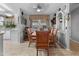 Cozy dining area with wood table and chairs, adjacent to kitchen at 215 N Power Rd # 361, Mesa, AZ 85205