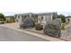 Single-story home with covered entry and landscaped yard at 215 N Power Rd # 361, Mesa, AZ 85205