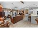 Comfortable living room with brown leather couch and wood cabinetry at 215 N Power Rd # 361, Mesa, AZ 85205
