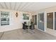 Covered patio with glass-top table and four chairs at 215 N Power Rd # 361, Mesa, AZ 85205